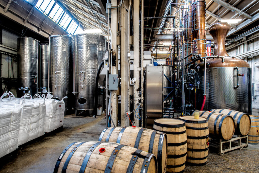 Aging barrels and processing tanks of Bourbon Distillery.
